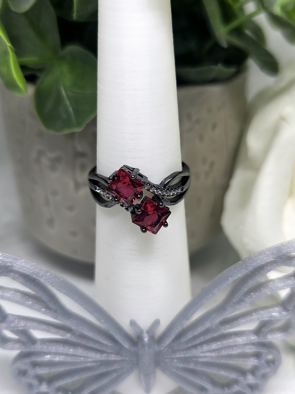 Elegant Gun Metal Ring with Deep Red Gemstones